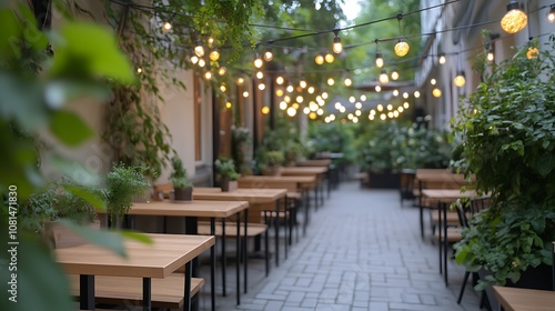 A cozy outdoor patio with string lights and greenery.