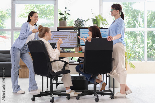 Team of female programmers ...