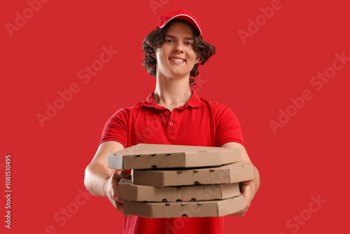Male courier with cardboard...