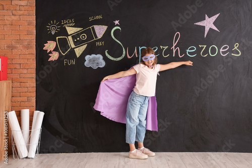 Teenage girl dressed as sup...