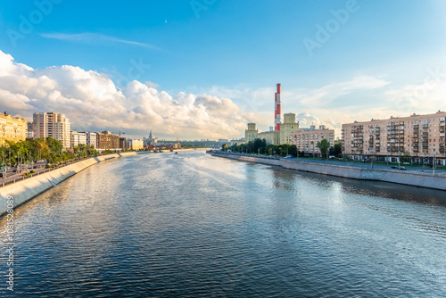 View of Berezhkovskaya Embankment in Moscow with reflection on a mirror stone surface photo