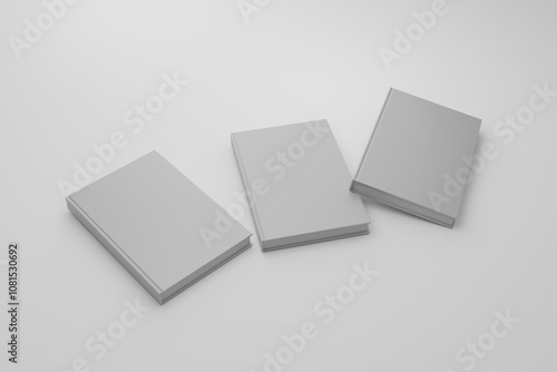 three blank white book 3d renderings on a white background with shadows. for your mock up design.