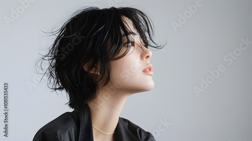 Elegant Sideview Portrait of a Japanese-Spanish Mixed Professional Musician CEO in Studio Lighting