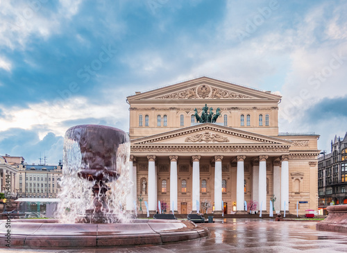 Fountain at Bolshoi theatre (Big theatre) in Moscow, Russia. Daylight view of the Bolshoi theatre in Moscow, Russia photo