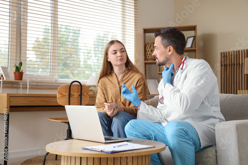 Young woman with thyroid gland problem and male endocrinologist at home