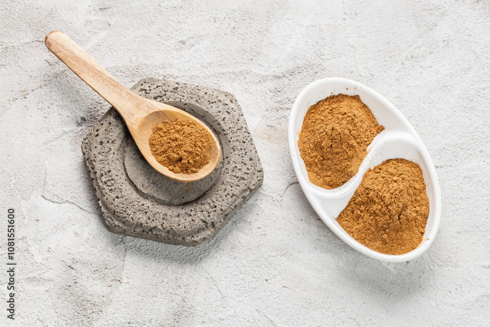 Cinnamon Sticks and Powder on White Background Cinnamon Sticks and Powder on White Background