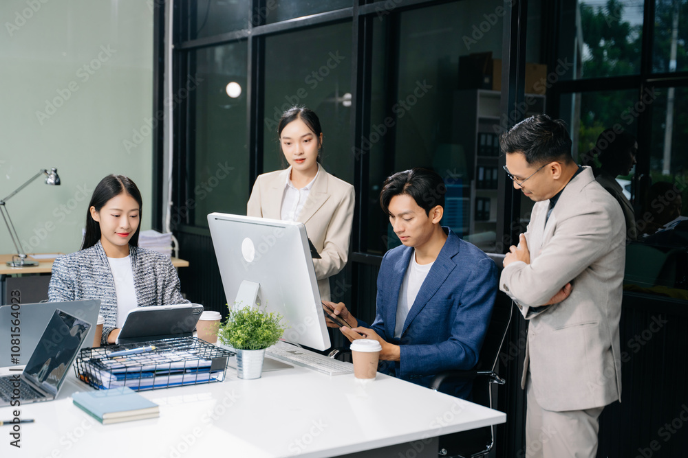 Office colleagues have a casual discussion. During a meeting in a conference room, a group of business teem Office colleagues have a casual discussion. During a meeting in a conference room, a group of business teem