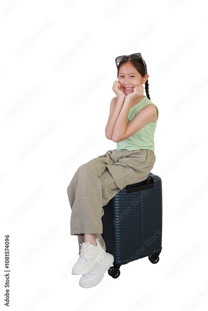 Portrait Asian girl child sitting on suitcase posing and looking straight camera isolated on white background. kid fashion and travel concept. Full body photo with clipping path. Portrait Asian girl child sitting on suitcase posing and looking straight camera isolated on white background. kid fashion and travel concept. Full body photo with clipping path.