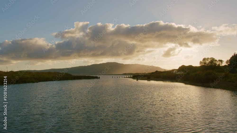 The Waikanae Estuary with Kapiti Island in the background at sunset, New Zealand The Waikanae Estuary with Kapiti Island in the background at sunset, New Zealand