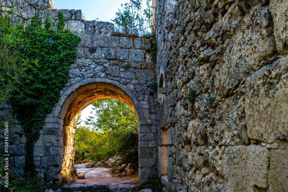 The ruins of an old fortress with an arch in close-up. The ruins of an old fortress with an arch in close-up.