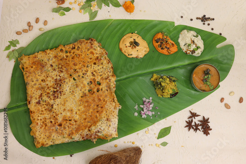 Rava masala dosa is a South Indian instant breakfast served with chutney and sambar photo