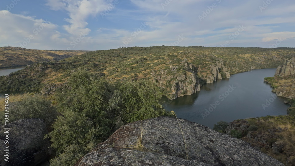 Panoramic view of Duero River Canyon with Rocky Cliffs and Blue Water Panoramic view of Duero River Canyon with Rocky Cliffs and Blue Water