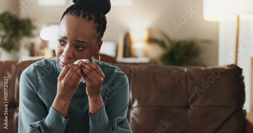 Tableau sur toile Crying, tissue and sad black woman with depression, thinking and psychological trauma in home living room