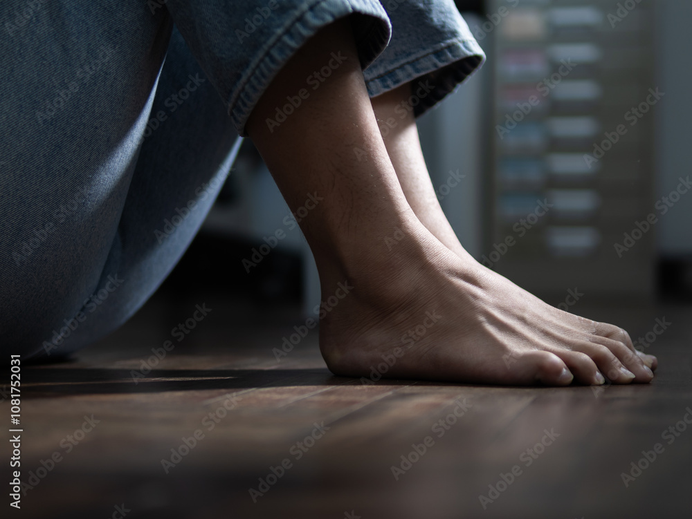 Foot relaxation in a cozy indoor space captured close-up intimate perspective on comfort and serenity Foot relaxation in a cozy indoor space captured close-up intimate perspective on comfort and serenity