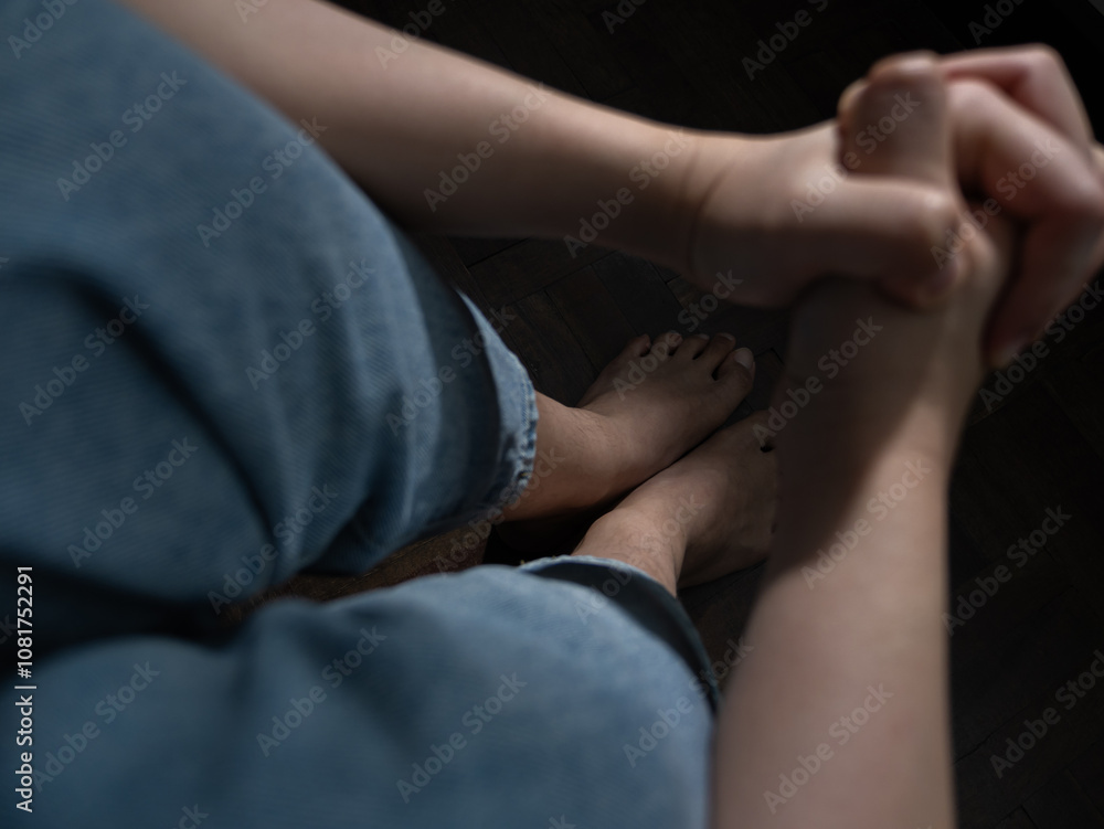 Emotional support gesture intimate setting personal reflection close-up view connection concept Emotional support gesture intimate setting personal reflection close-up view connection concept