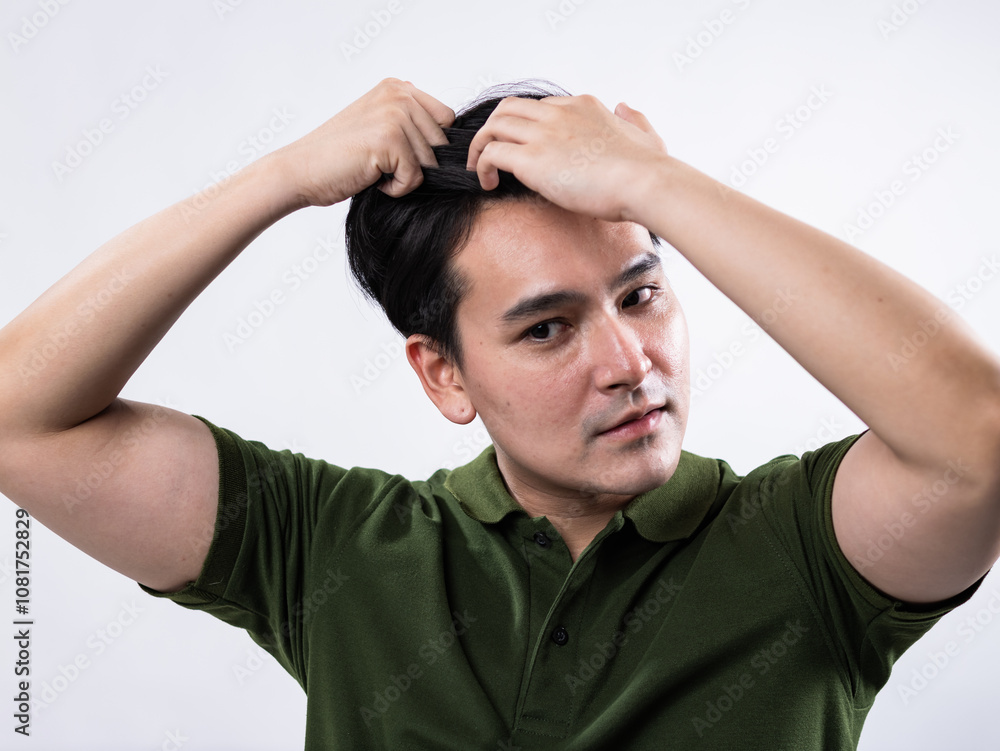 Personal grooming action young male subject studio setting portrait photography close-up view self-care concept Personal grooming action young male subject studio setting portrait photography close-up view self-care concept