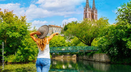 Woman tourist  traveling in France. City of Niort, Poitou Charente photo