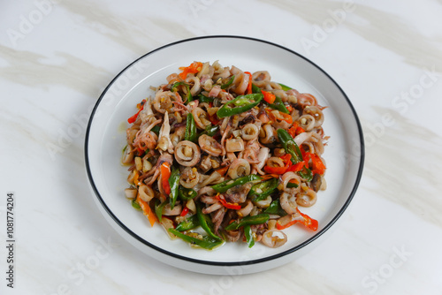 stir-fried salted squid with green chili. Perfect for recipe, article, catalogue, or any commercial purposes. with copy space. photo