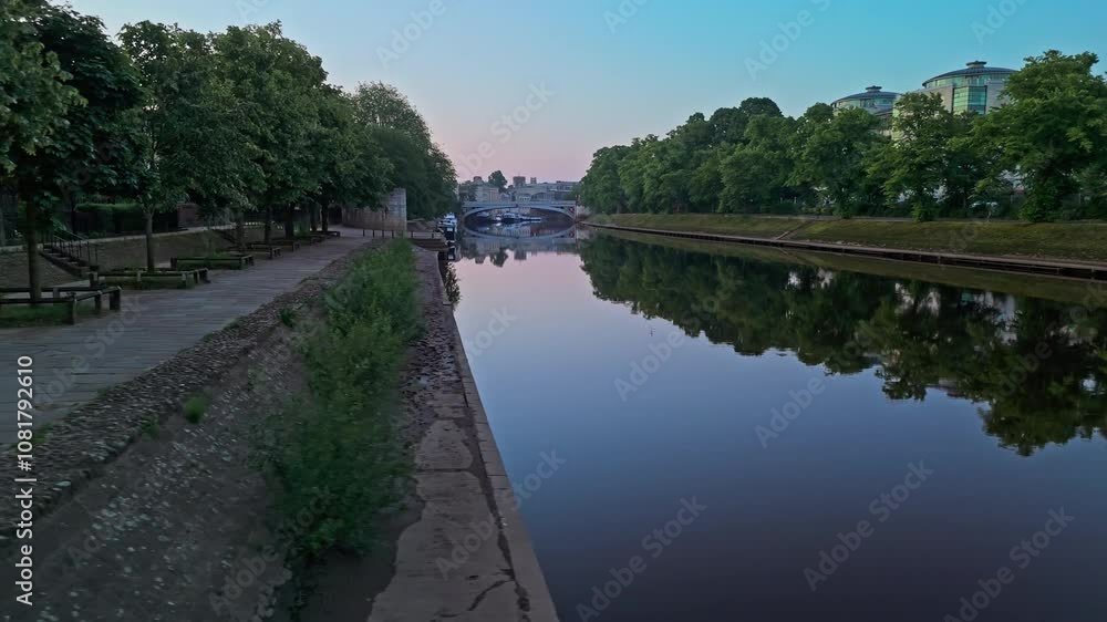 Establishing Drone Shot across River Ouse in York at Sunrise UK Establishing Drone Shot across River Ouse in York at Sunrise UK