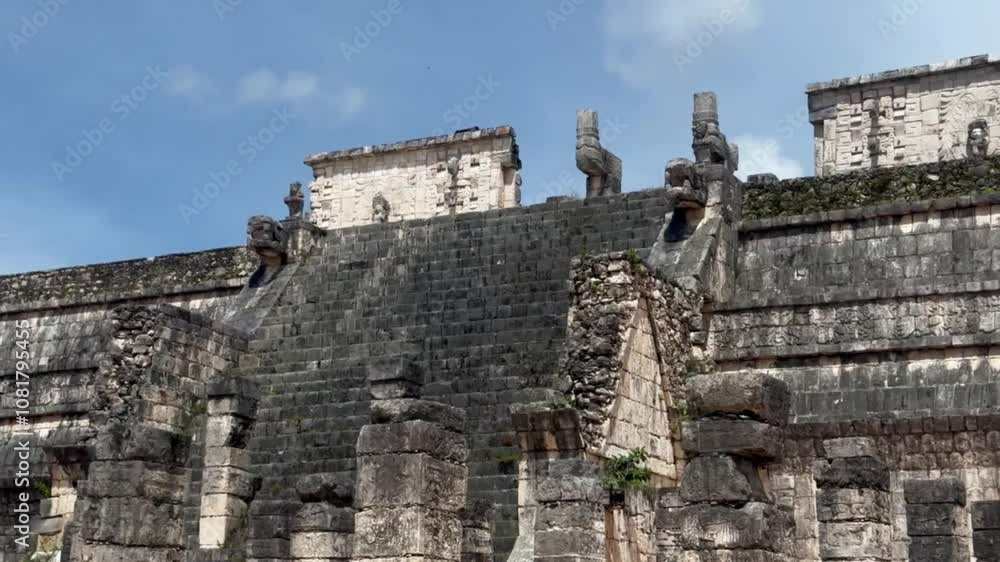 Handheld close-up panning shot of the Temple of Warriors in Chichen Itza, Mexico. 4K Handheld close-up panning shot of the Temple of Warriors in Chichen Itza, Mexico. 4K