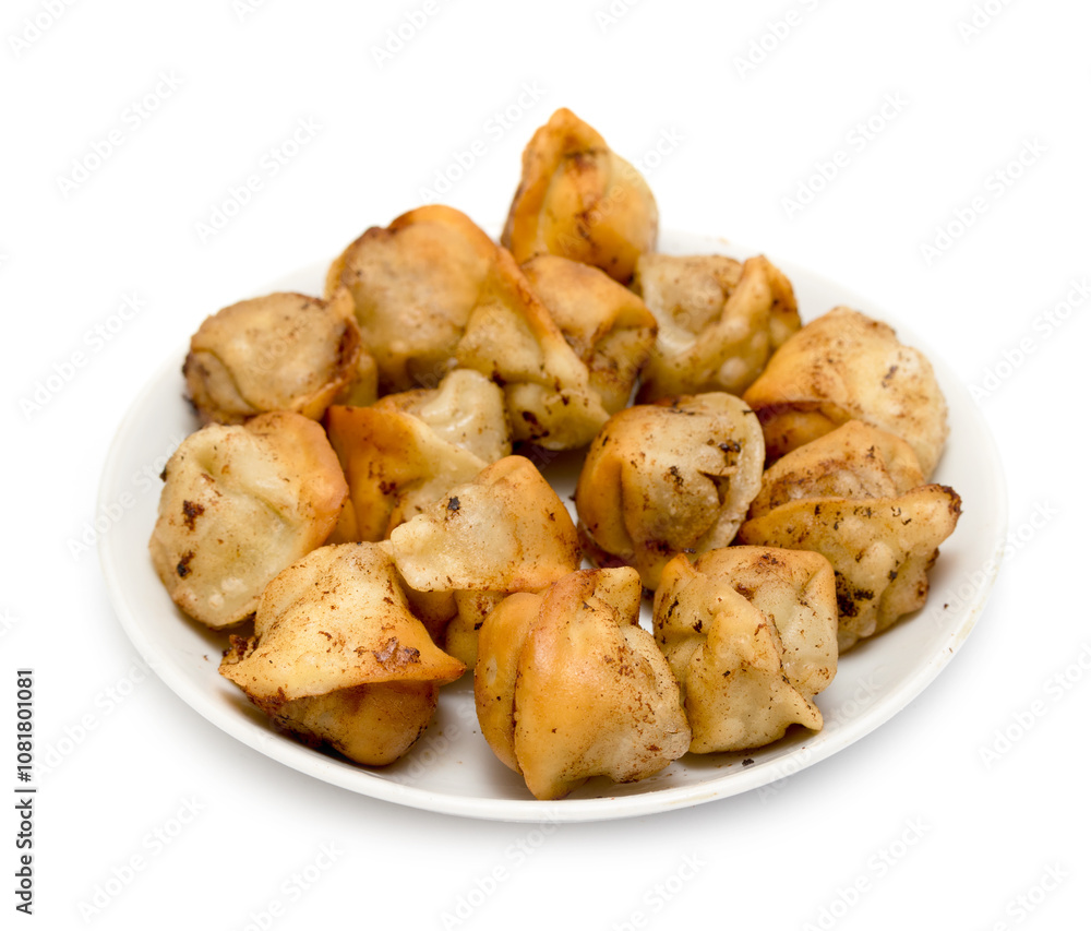 fried dumplings in a plate on a white background fried dumplings in a plate on a white background