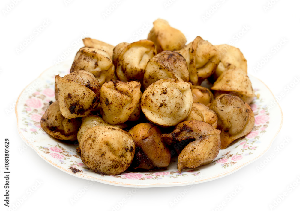 fried dumplings in a plate on a white background fried dumplings in a plate on a white background