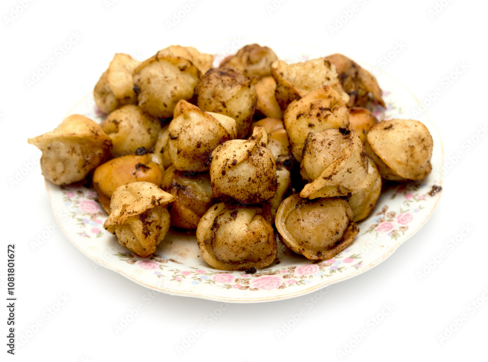 fried dumplings in a plate on a white background fried dumplings in a plate on a white background