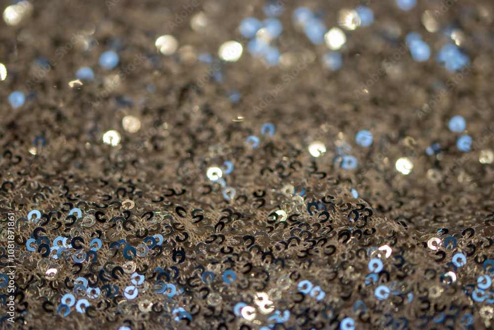 Close-Up of Sparkling Silver Sequins: Shimmering Texture and Glittery Surface Creating a Festive, Glamorous Background for Fashion and Decor Close-Up of Sparkling Silver Sequins: Shimmering Texture and Glittery Surface Creating a Festive, Glamorous Background for Fashion and Decor