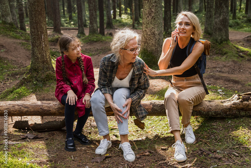 Senior woman dislocates ankle on forest strolling