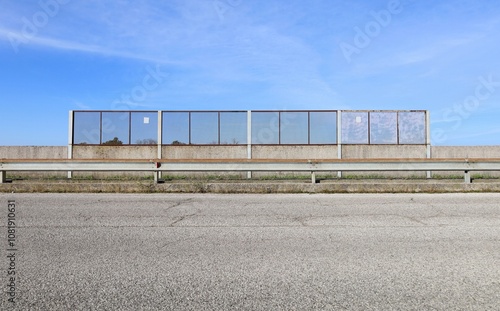 Wallpaper Mural Guardrail protecting sidewalk with a safety railing and the sky on behind. Road in front. Background for copy space. Torontodigital.ca