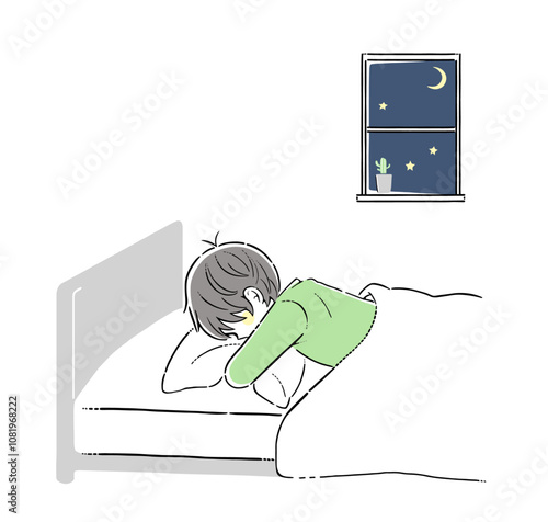 うつ伏せで枕を抱いて眠る少年