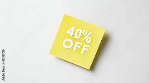 White '40% OFF' Text on a Light Yellow Square Paper Note. White Background with Copy Space