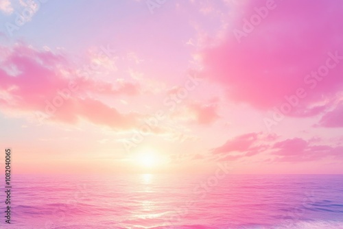 A serene landscape of the ocean during sunset with calm waves and a warm glow