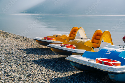 Obraz na płótnie Water pedal boats near the pier