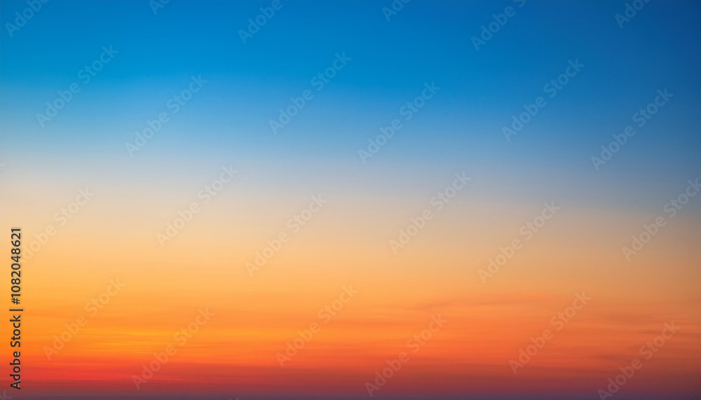 Obraz premium Orange and blue sunset sky gradient