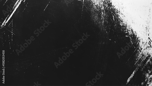 Black grunge scratched background with old film effect and dusty scary texture; space for text or design. Dark and scratched black grunge background, scratched black texture vintage film style.