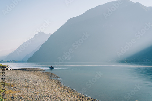 Obraz na plátně Rowing boat floating over the Lake.