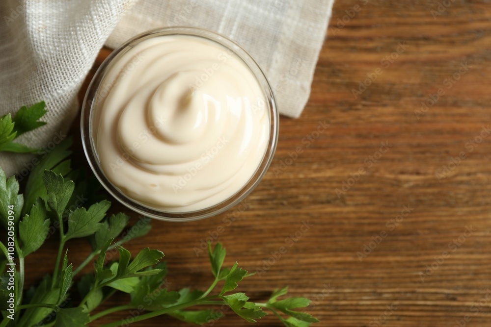 Bowl with mayonnaise and ingredients for cooking on the table Bowl with mayonnaise and ingredients for cooking on the table