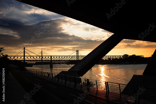 Panorama of Belgrade brigdes over the Sava river (Ada, Gazela, the old and the new railway bridges) taken during a sunset. Belgrade is the capital city of serbia.