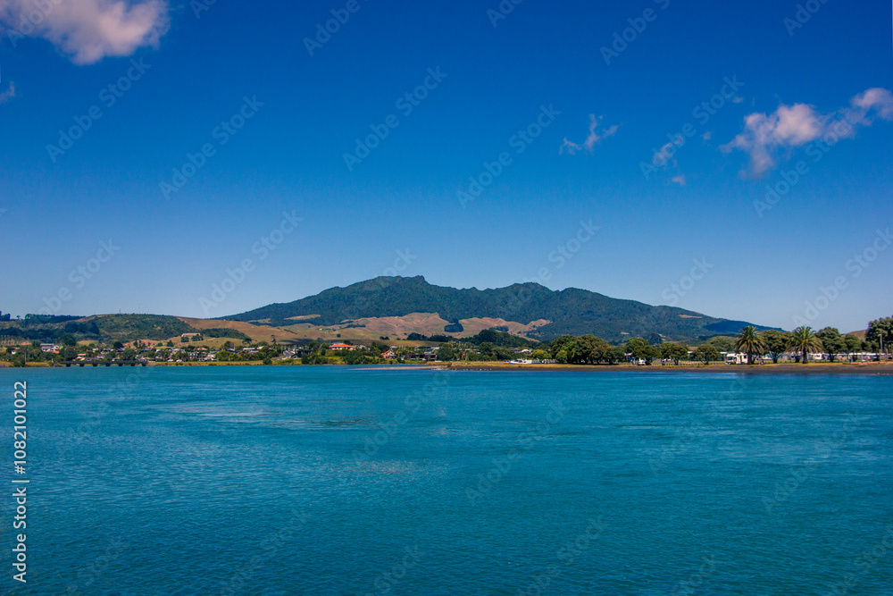 View over holiday park across sheltered bay at Tawatahi River. Raglan, New Zealand View over holiday park across sheltered bay at Tawatahi River. Raglan, New Zealand