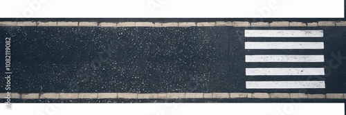 Aerial View of Road with Crosswalk: A textured road surface with a stark white crosswalk is captured in an aerial shot. The perspective offers a unique view of the road.