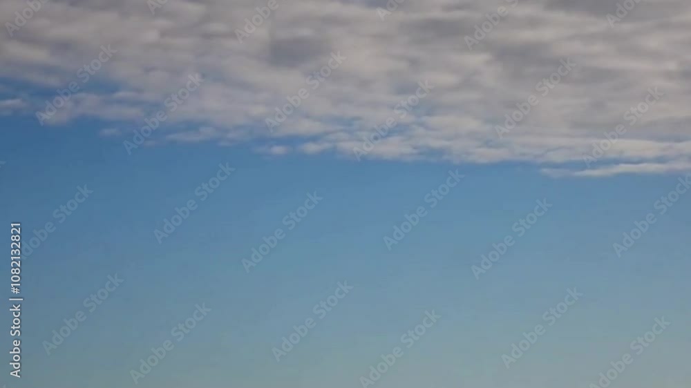 Soft clouds moving in the bright blue sky Soft clouds moving in the bright blue sky
