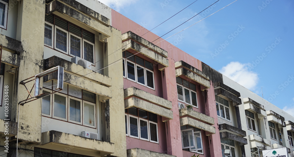 Obraz premium Detailed view of windows, doors and balconies of city buildings