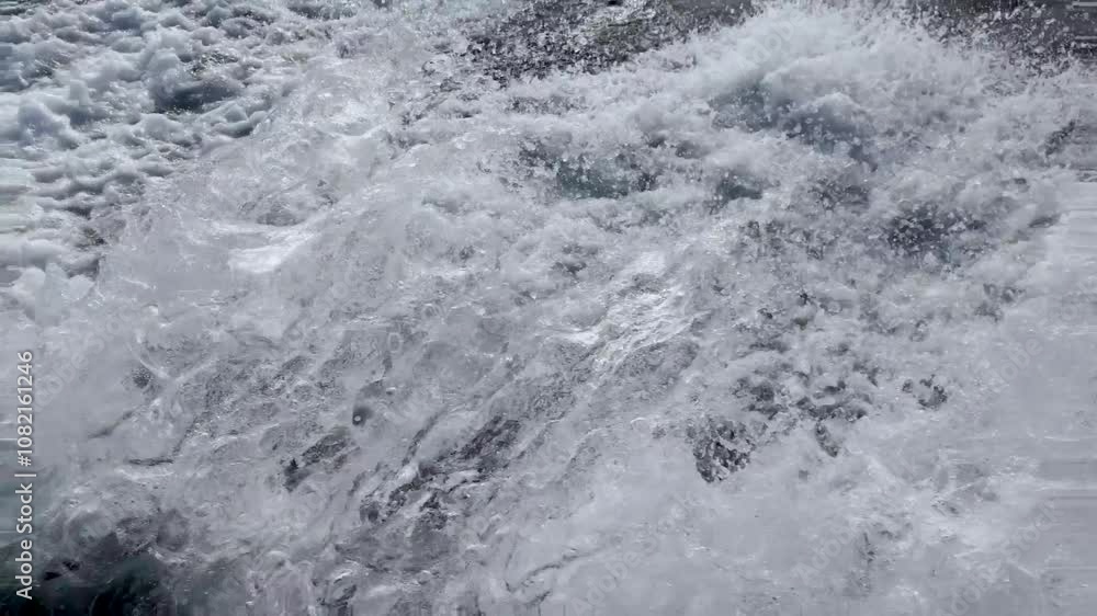 Backwash waves made by a motor boat at sea in slow motion Backwash waves made by a motor boat at sea in slow motion
