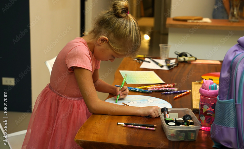 A mother and her young daughter engage in a colorful painting activity A mother and her young daughter engage in a colorful painting activity