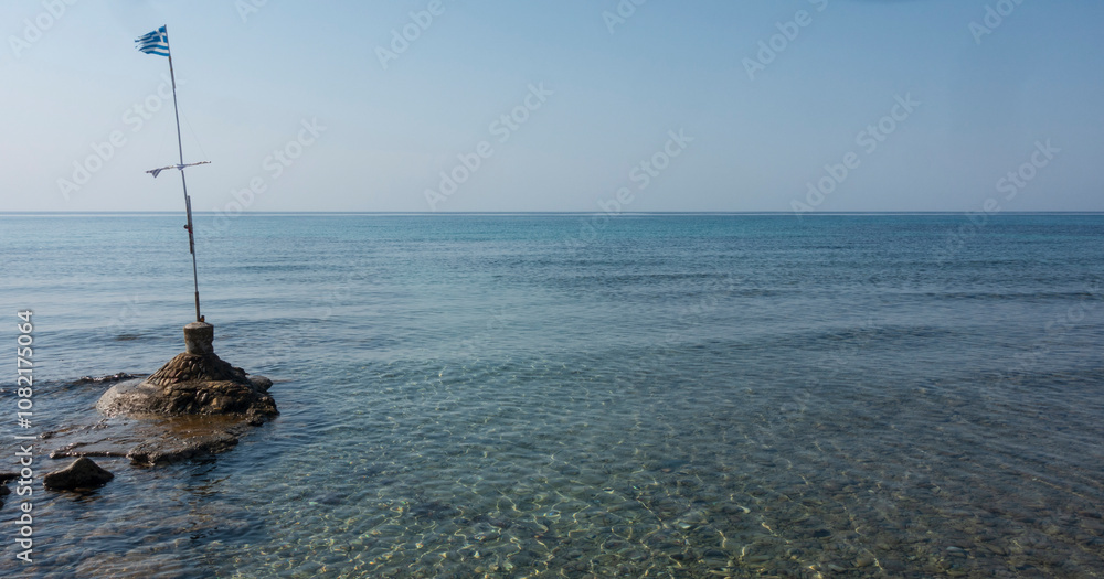 A person relaxes on a blue surfboard in a tranquil turquoise sea, while a lone bird flies above, capturing the peaceful atmosphere and sense of solitude. A person relaxes on a blue surfboard in a tranquil turquoise sea, while a lone bird flies above, capturing the peaceful atmosphere and sense of solitude.