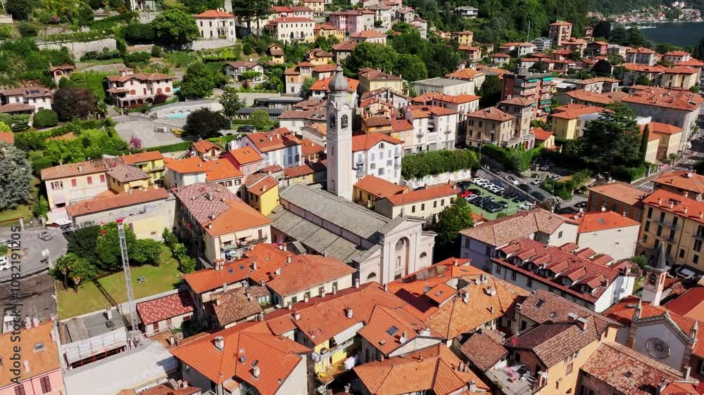 Sunny summer aerial scene of Menaggio, Italy, showcasing vibrant red roofs, 4K Sunny summer aerial scene of Menaggio, Italy, showcasing vibrant red roofs, 4K