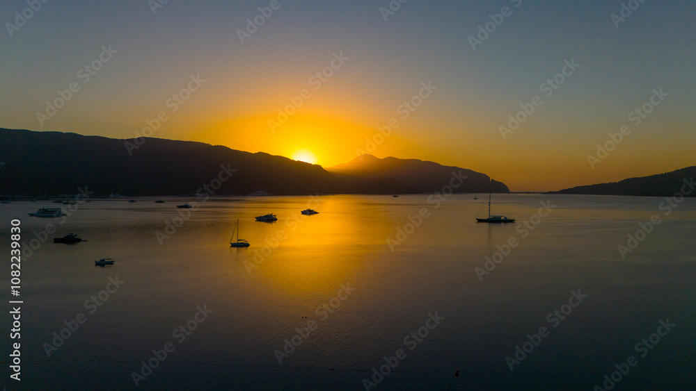 Drone aerial view of Marmaris and the mountains around during sunrise Drone aerial view of Marmaris and the mountains around during sunrise