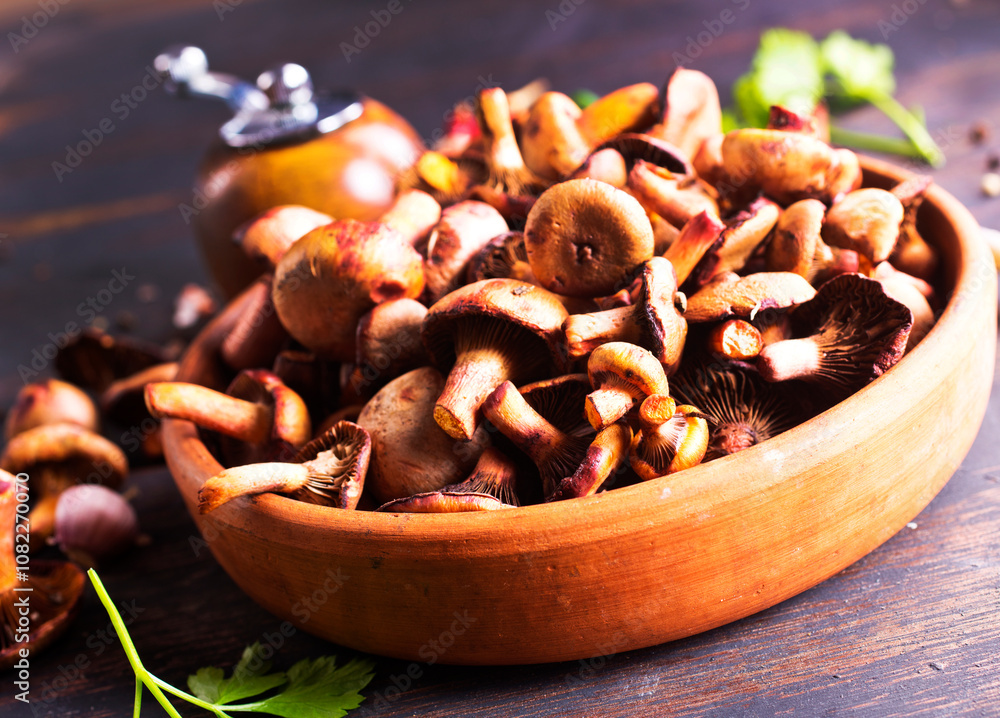 edible mushroom in bowl on a table edible mushroom in bowl on a table