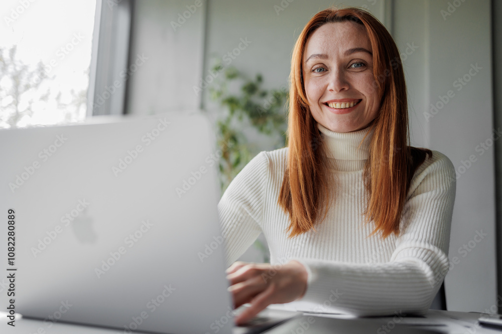 Woman Working on Laptop in Cozy Home Office Woman Working on Laptop in Cozy Home Office